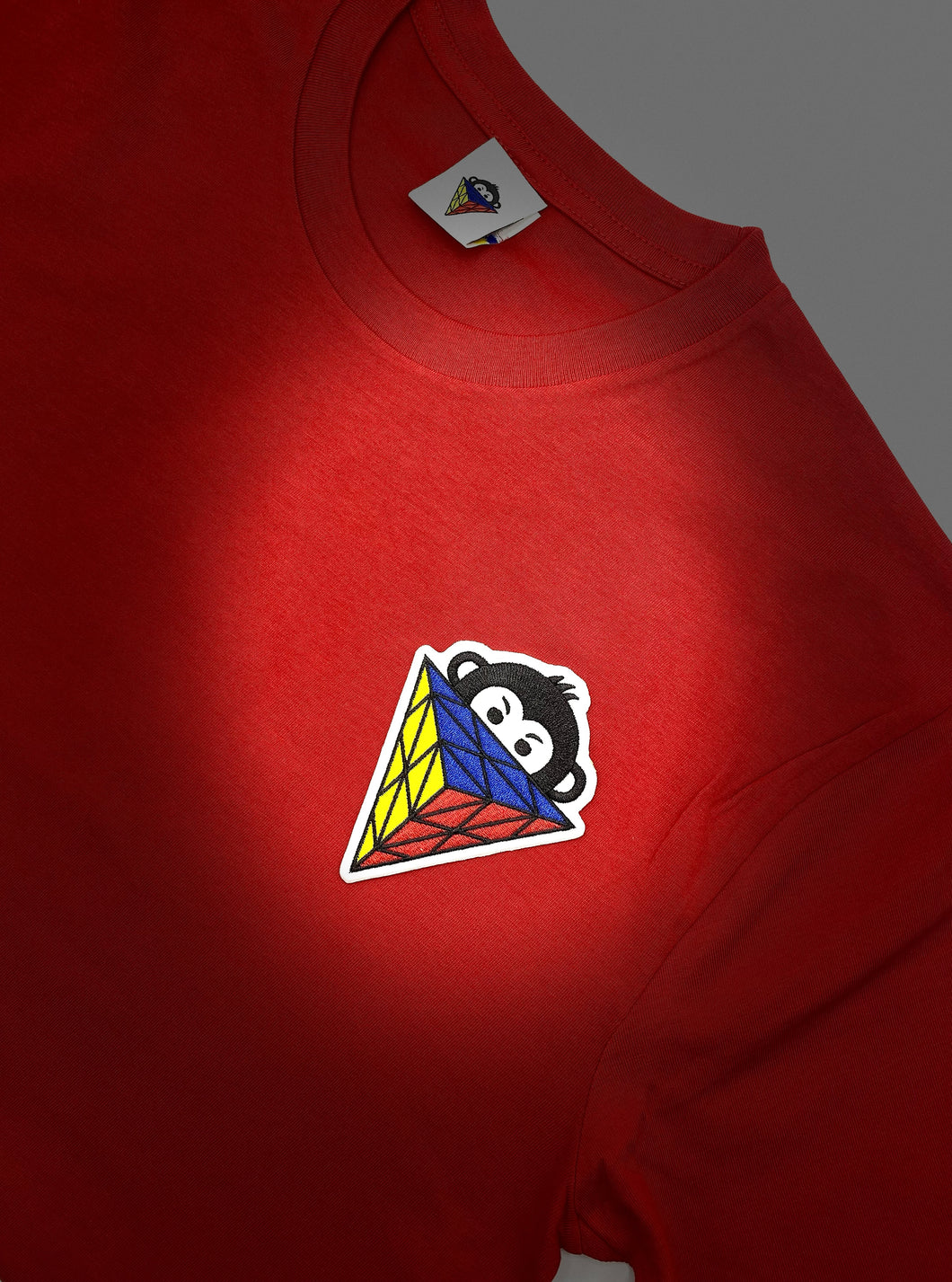 Red patch tee.